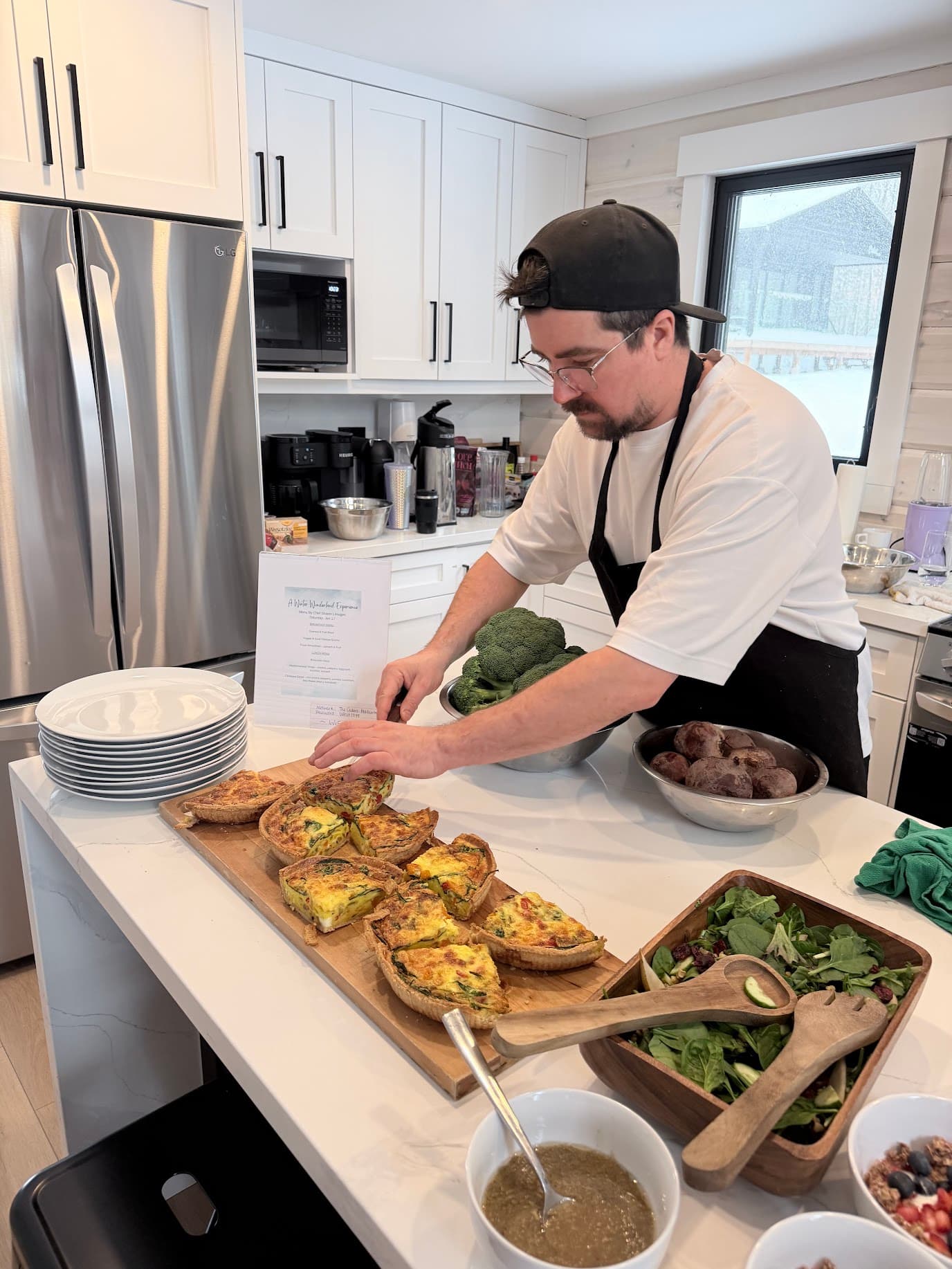 Chef plating courses in the kitchen