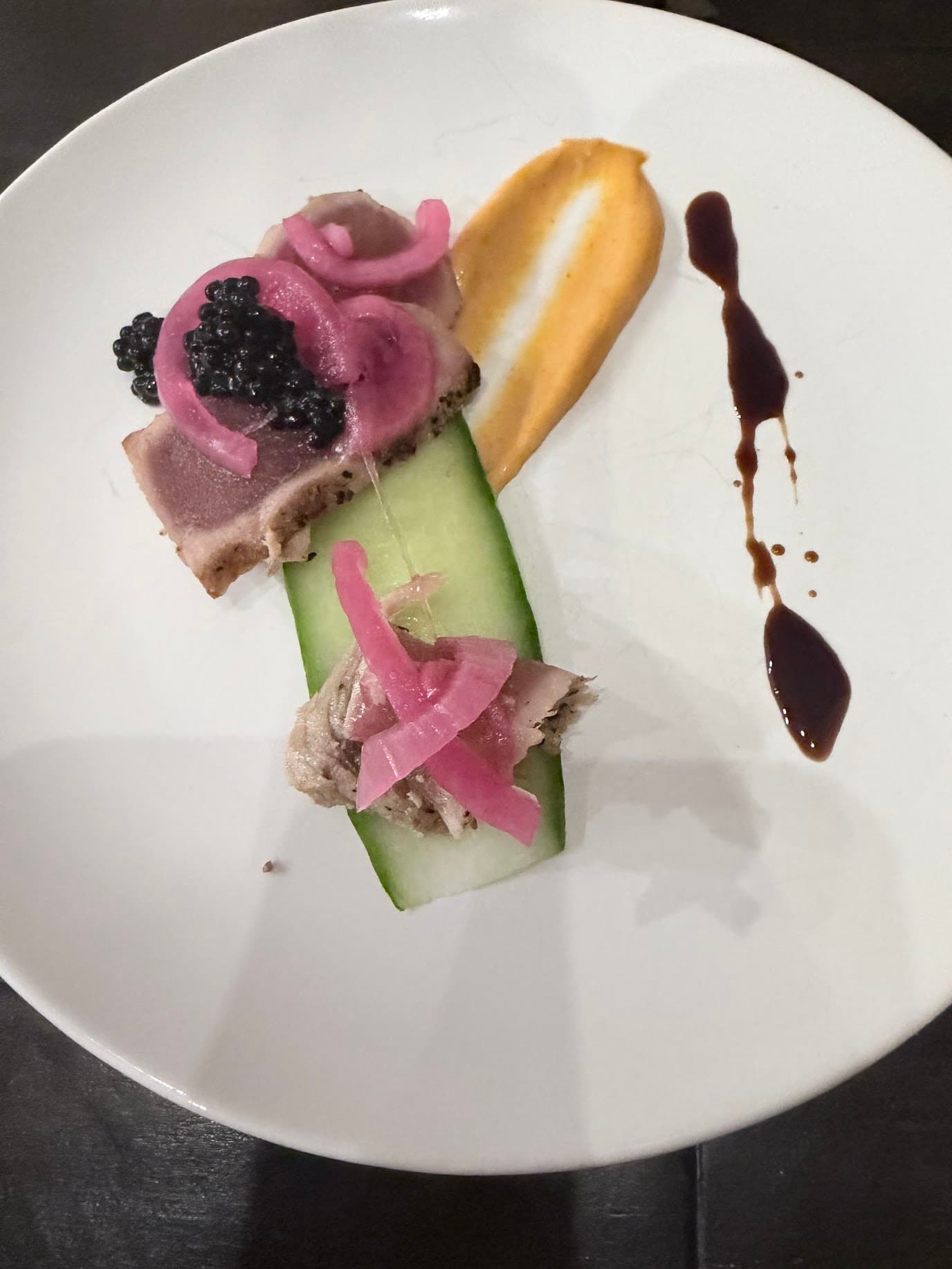 Plated tuna course with caviar